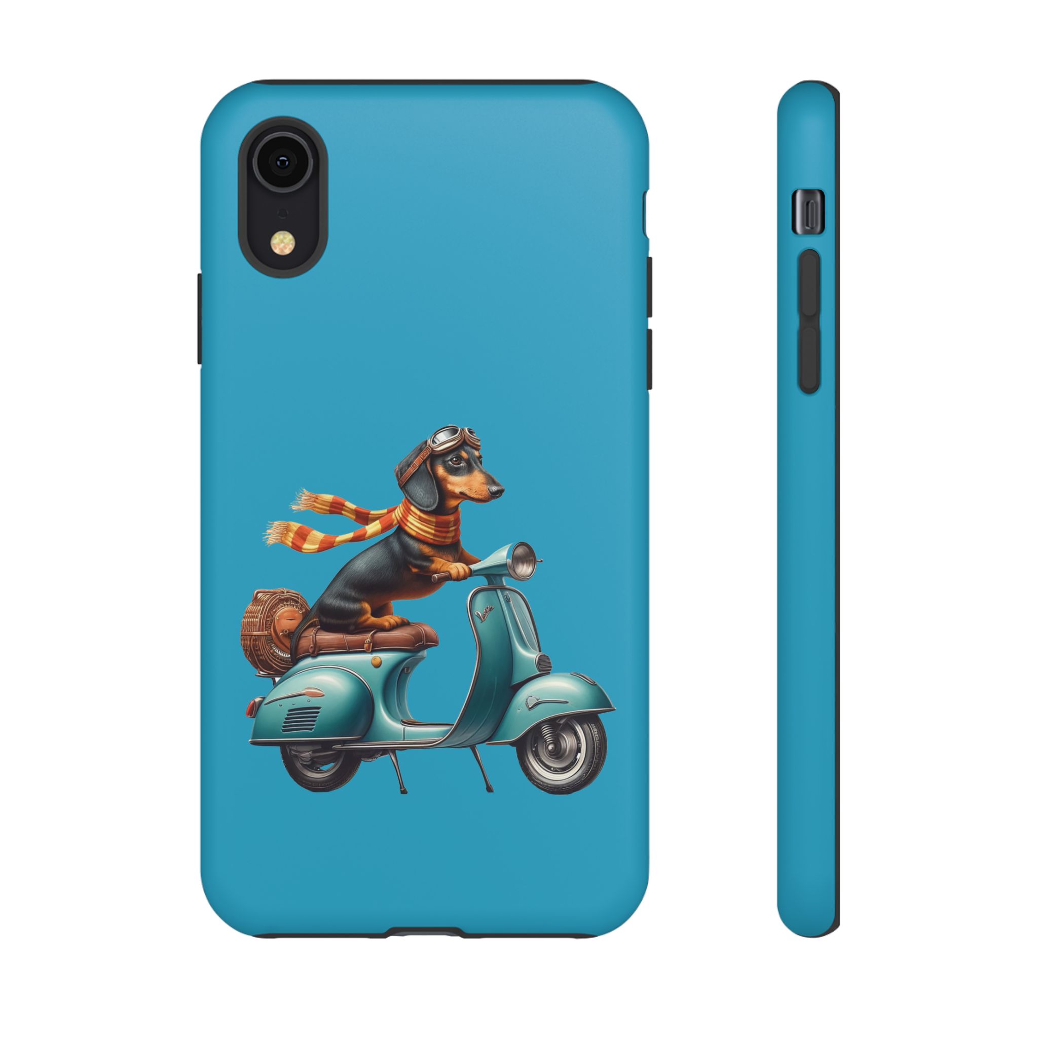 Dachshund wearing goggles and a scarf riding a vintage scooter with a suitcase.