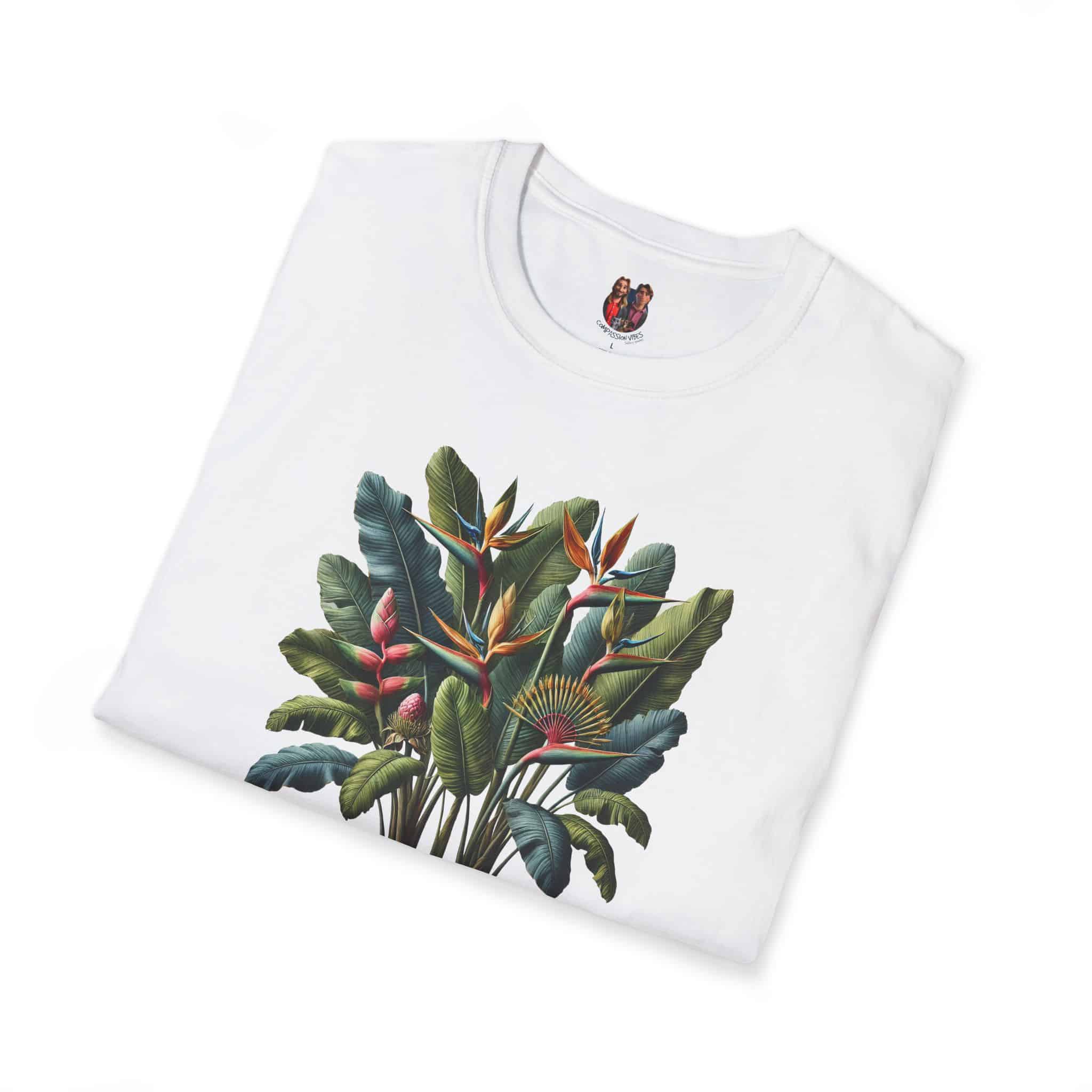 White t-shirt featuring a vibrant tropical plant design with leaves and flowers.