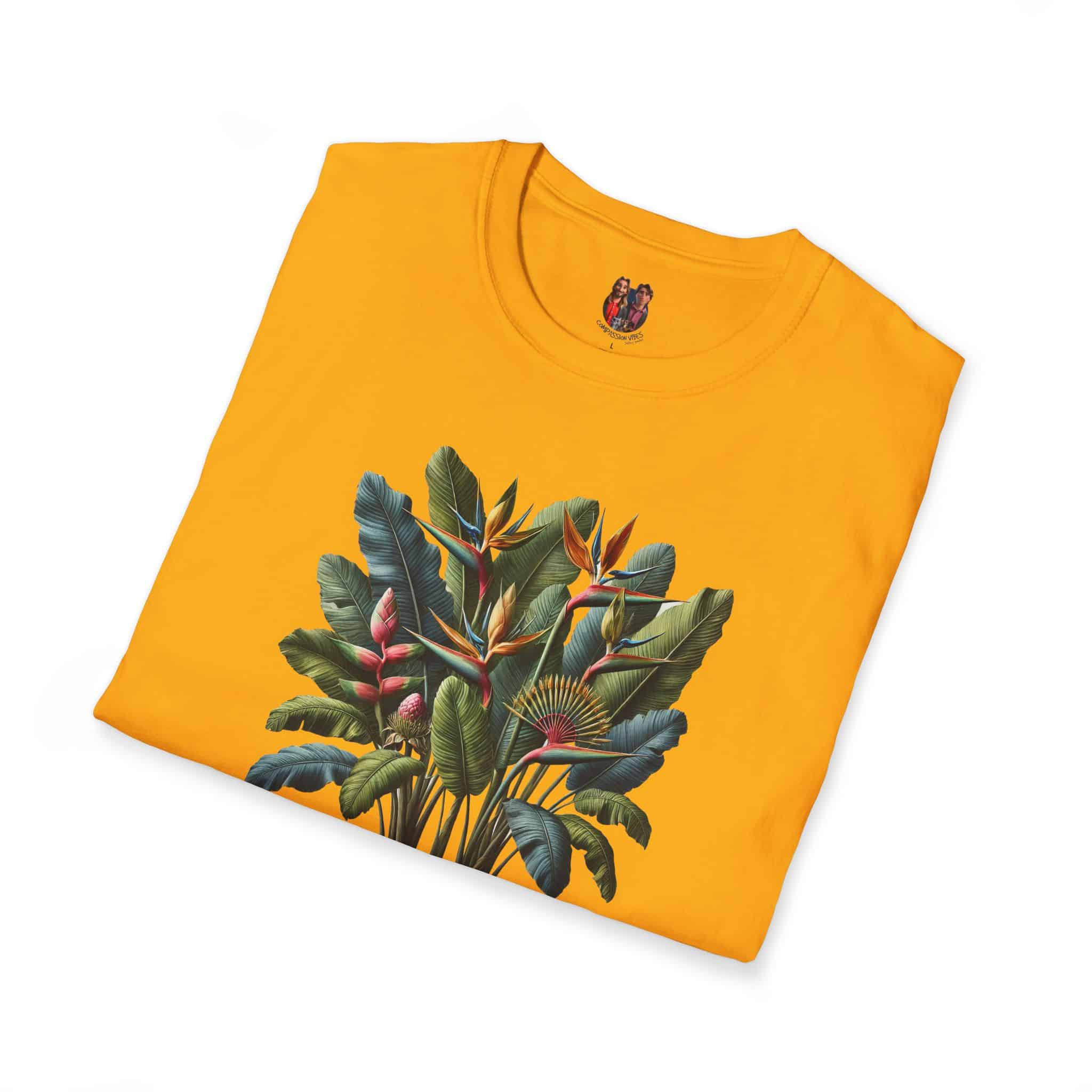 Yellow t-shirt featuring a vibrant tropical plant design with leaves and flowers.