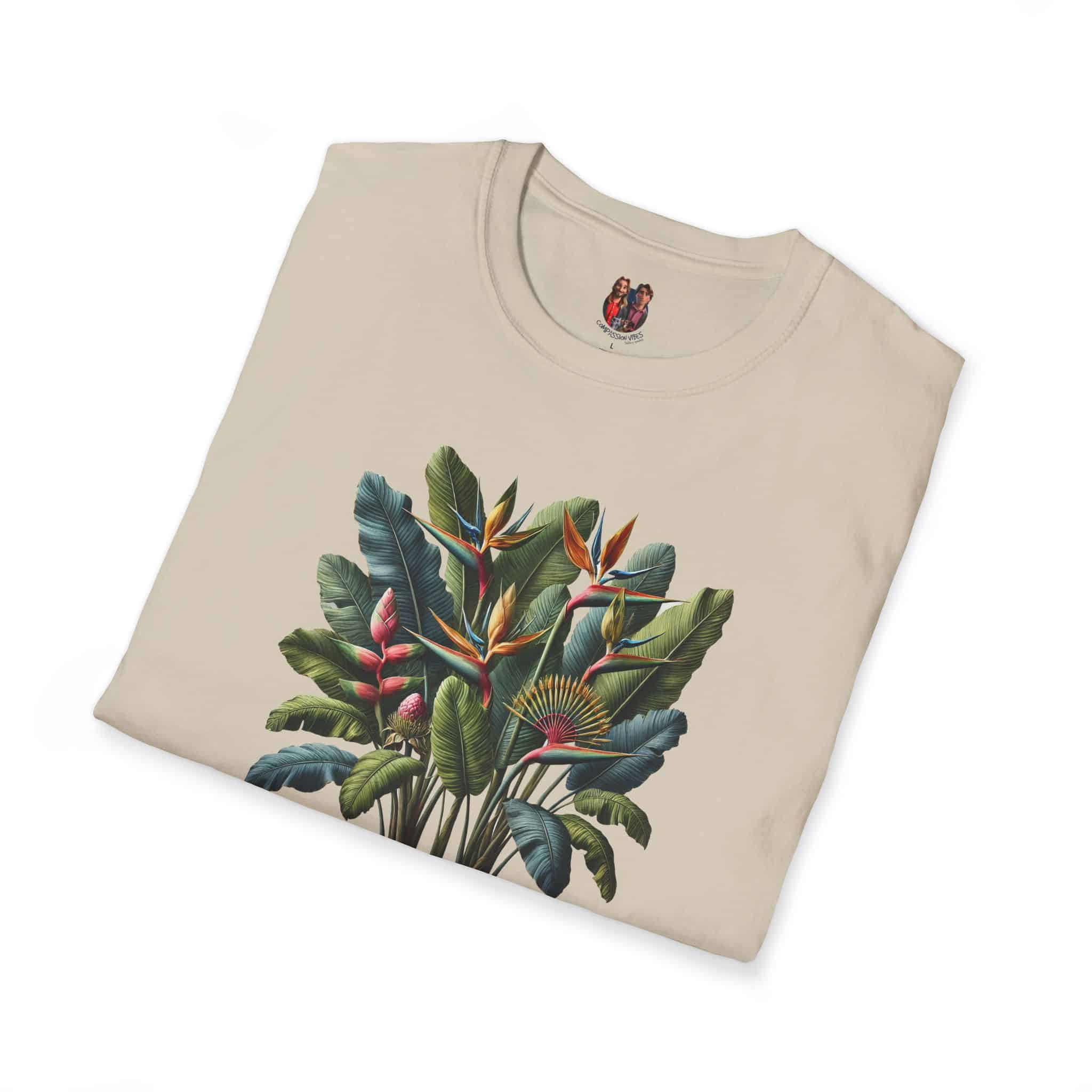 Beige T-shirt featuring a colorful tropical plant design with leaves and flowers.