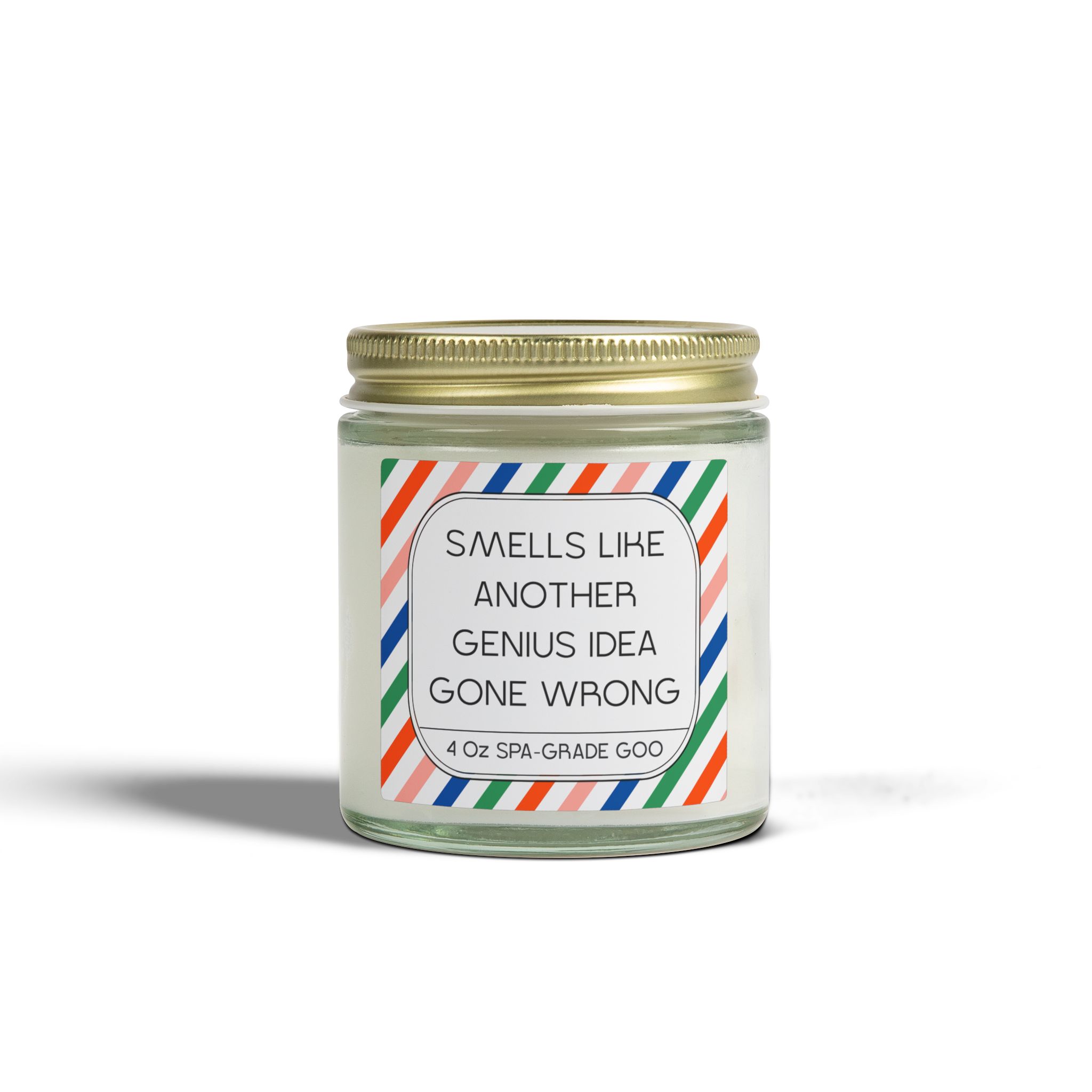 4 oz candle in a glass jar labeled 'Smells Like Another Genius Idea Gone Wrong' with a colorful striped design.
